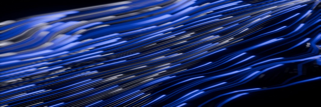 Abstract blue light trails flowing across a dark surface